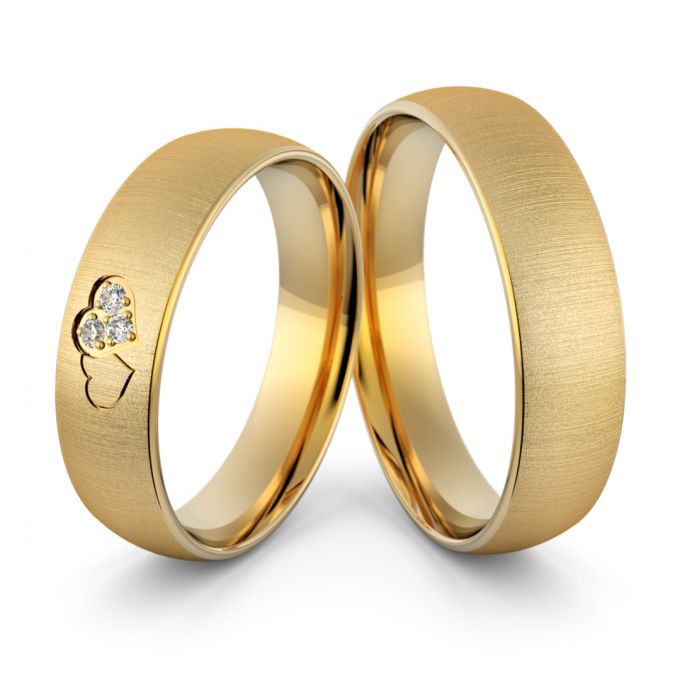 Obrączki ślubne złote klasyczne zaokrąglone ze splecionymi sercami i brylantami