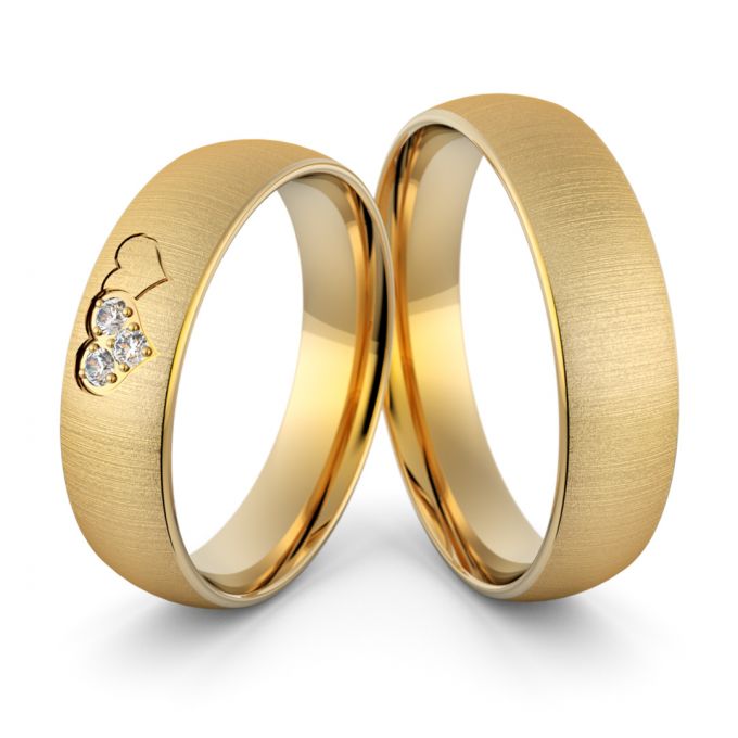 Obrączki ślubne złote klasyczne zaokrąglone z kamieniami i splecionymi sercami