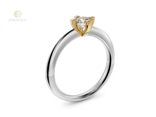Piękny zaręczynowy pierścionek składający się z białej szyny i żółtej korony